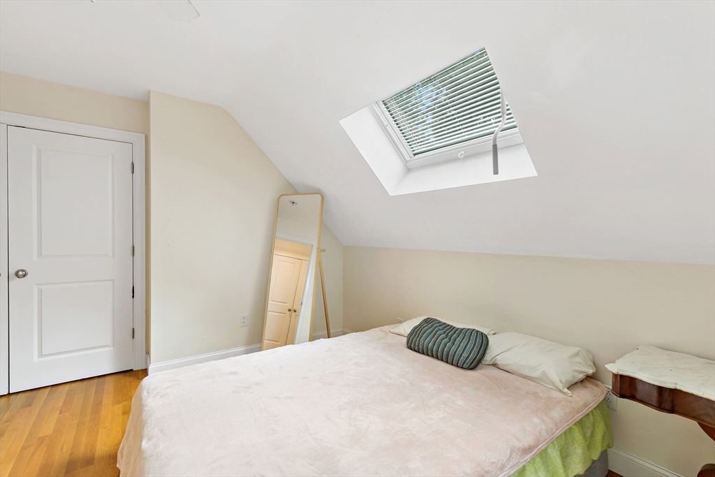 50 Pheasant Way Barnstable, MA 02632 - Photo 17 of 37 a bedroom with a bed and cabinets