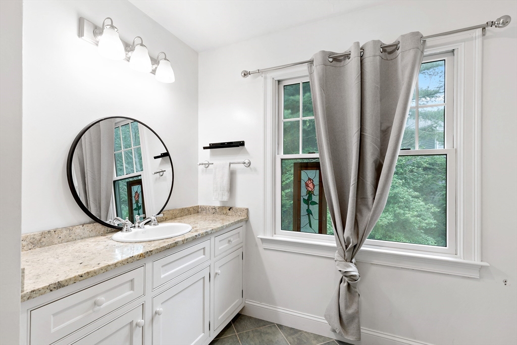 50 Pheasant Way Barnstable, MA 02632 - Photo 18 of 37 a view of a mirror on a dresser