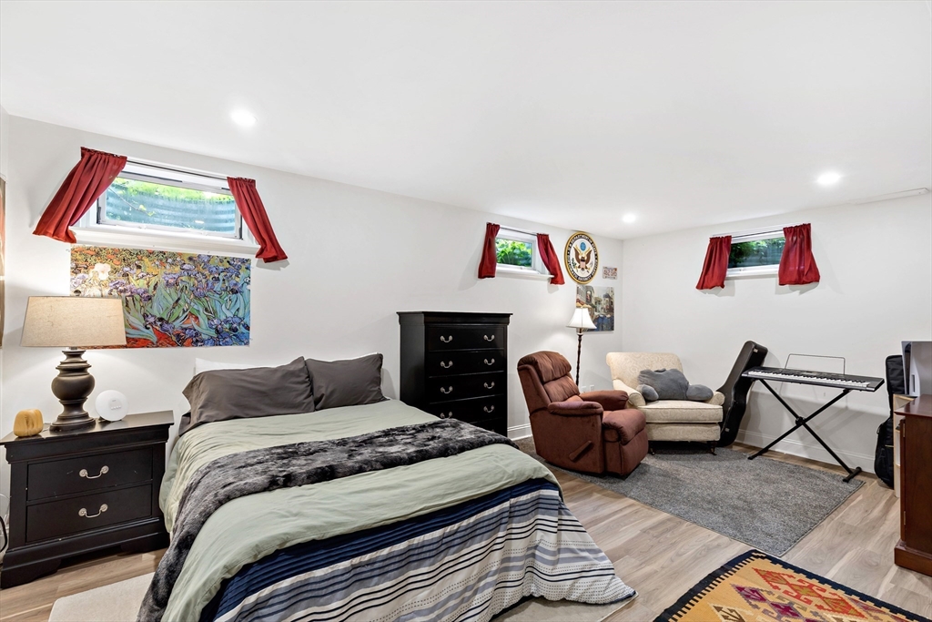 50 Pheasant Way Barnstable, MA 02632 - Photo 20 of 37 a bedroom with a bed and a couch