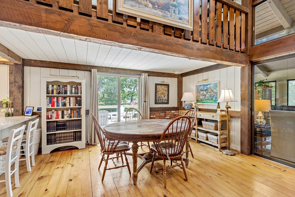 50 Pheasant Way Barnstable, MA 02632 - Photo 28 of 37 a view of a dining room with furniture window and wooden floor