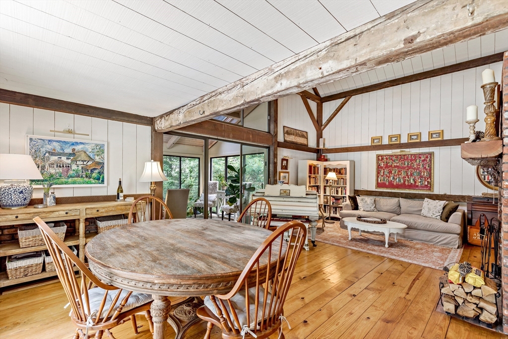 50 Pheasant Way Barnstable, MA 02632 - Photo 30 of 37 a dinning table and chairs in a patio