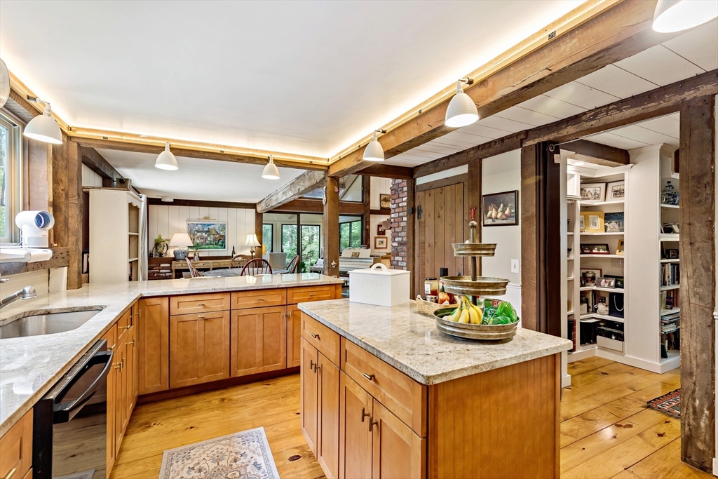 50 Pheasant Way Barnstable, MA 02632 - Photo 33 of 37 a kitchen with stainless steel appliances granite countertop a sink and cabinets