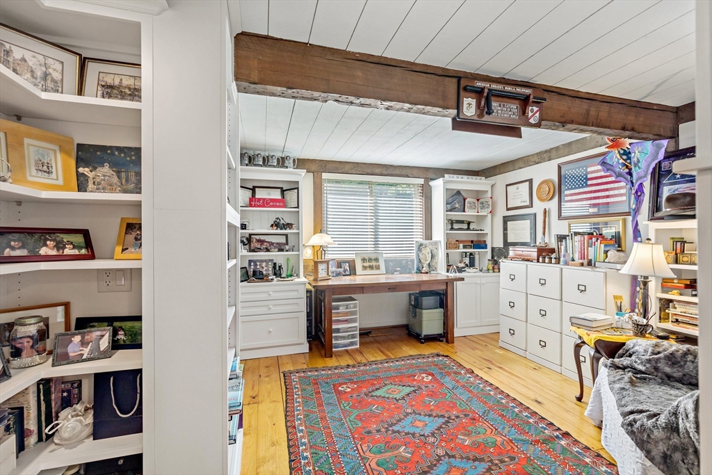 50 Pheasant Way Barnstable, MA 02632 - Photo 36 of 37 a bedroom with furniture and a book shelf