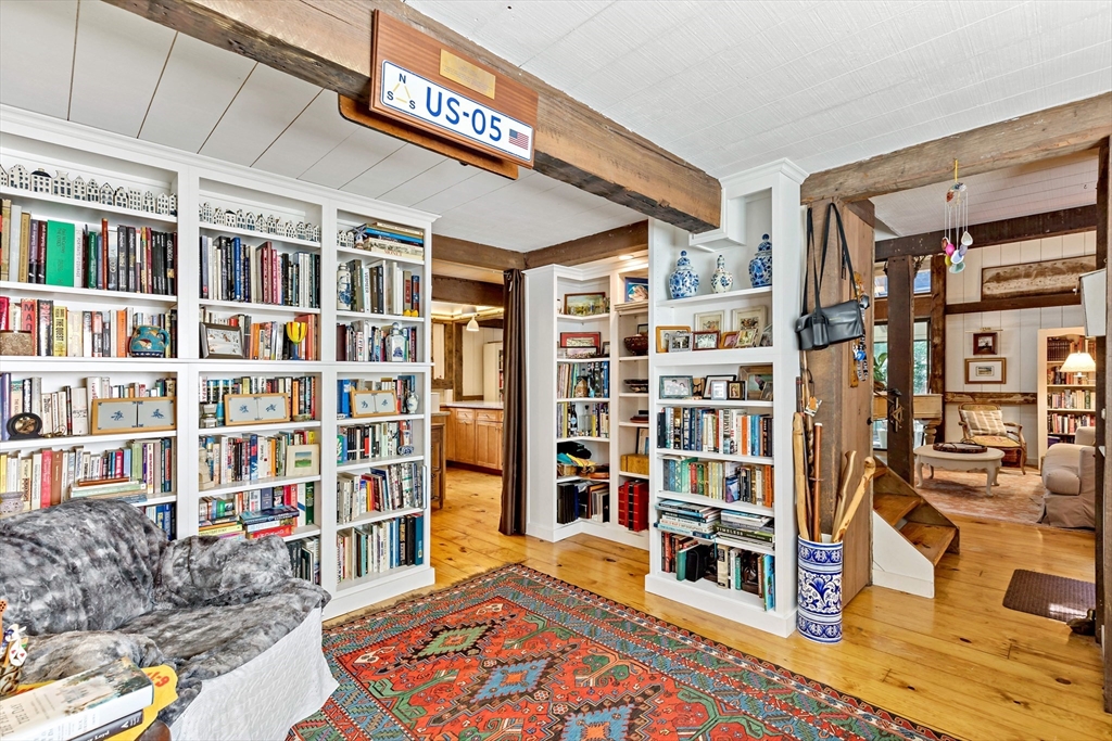 50 Pheasant Way Barnstable, MA 02632 - Photo 37 of 37 a view of living room with furniture and book shelf