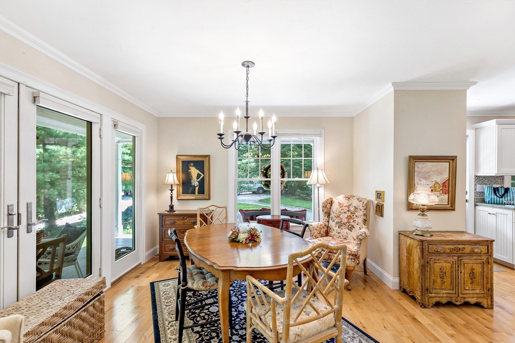 50 Pheasant Way Barnstable, MA 02632 - Photo 7 of 37 a dining room with furniture a window and wooden floor