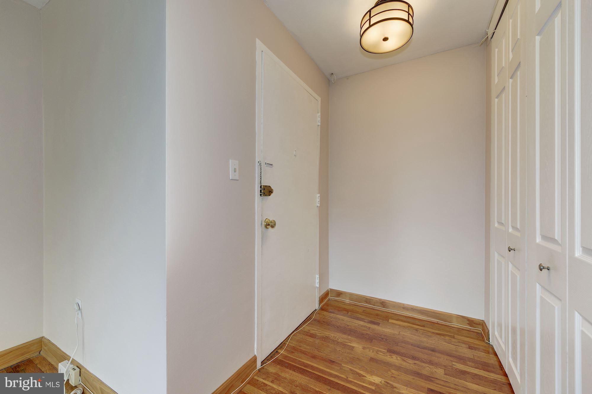 1300 South Arlington Ridge Road, Unit 508 Arlington, VA 22202 - Photo 12 of 24 a view of a room with wooden floor