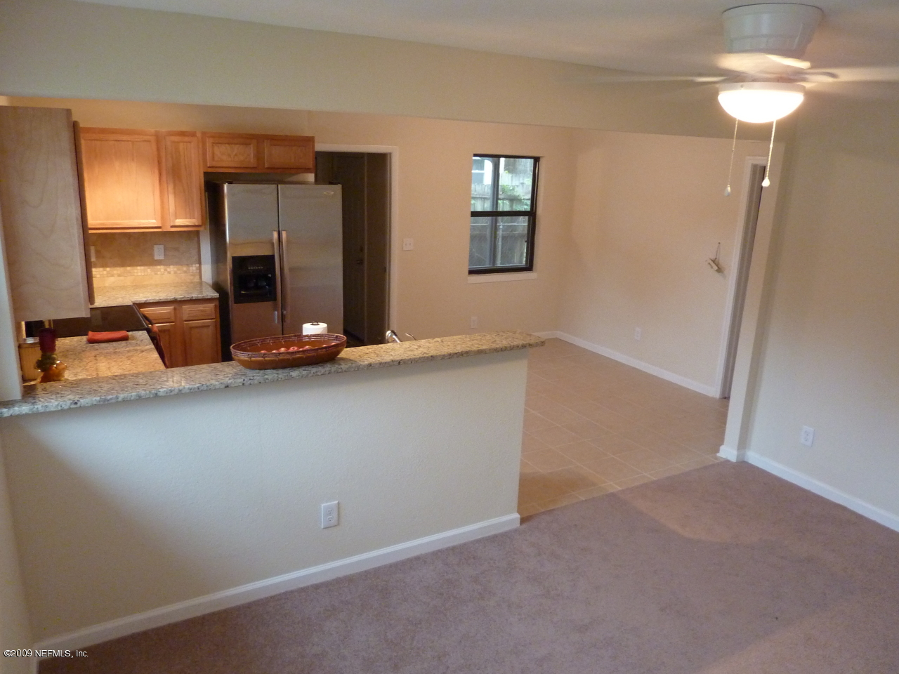1638 Morgana Road Jacksonville, FL 32211 - Photo 4 of 8 an empty room with windows and closet