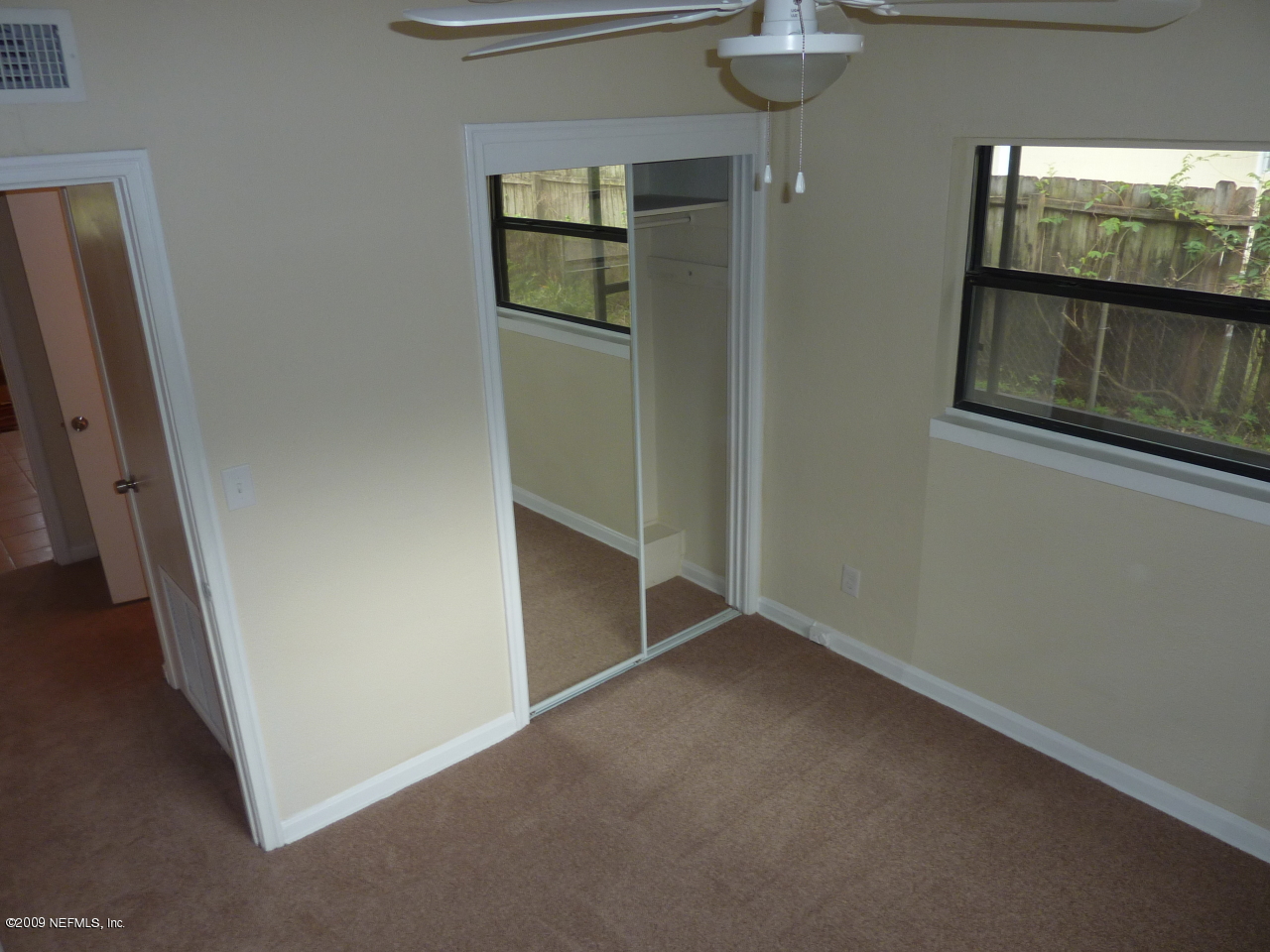 1638 Morgana Road Jacksonville, FL 32211 - Photo 5 of 8 an empty room with windows