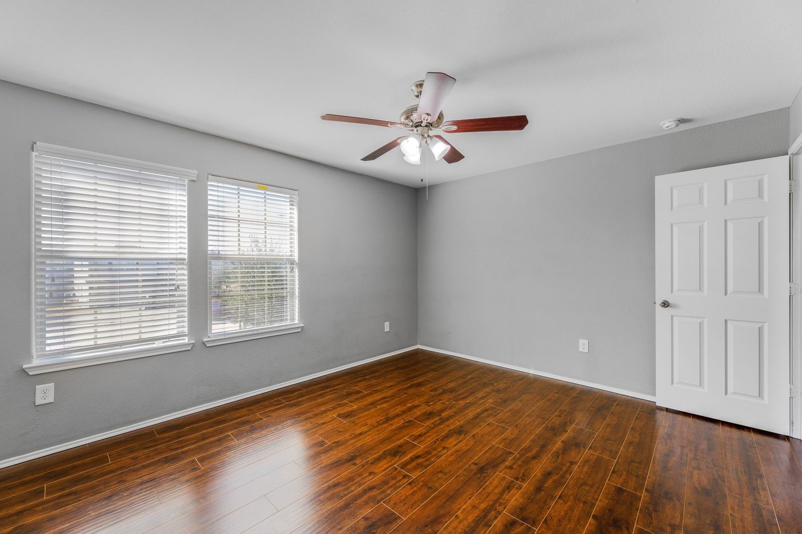 21310 Bandera Ranch Lane Katy, TX 77449 - Photo 20 of 39 a view of empty room with wooden floor and fan