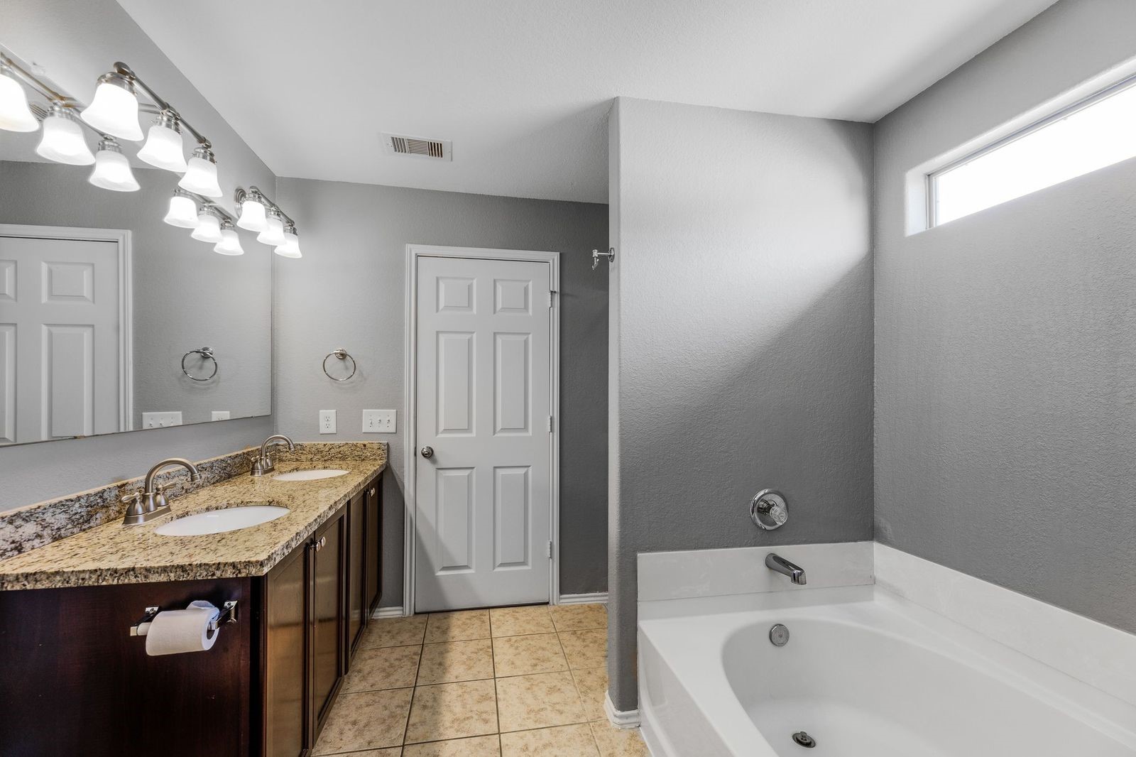 21310 Bandera Ranch Lane Katy, TX 77449 - Photo 21 of 39 a bathroom with a sink and a mirror