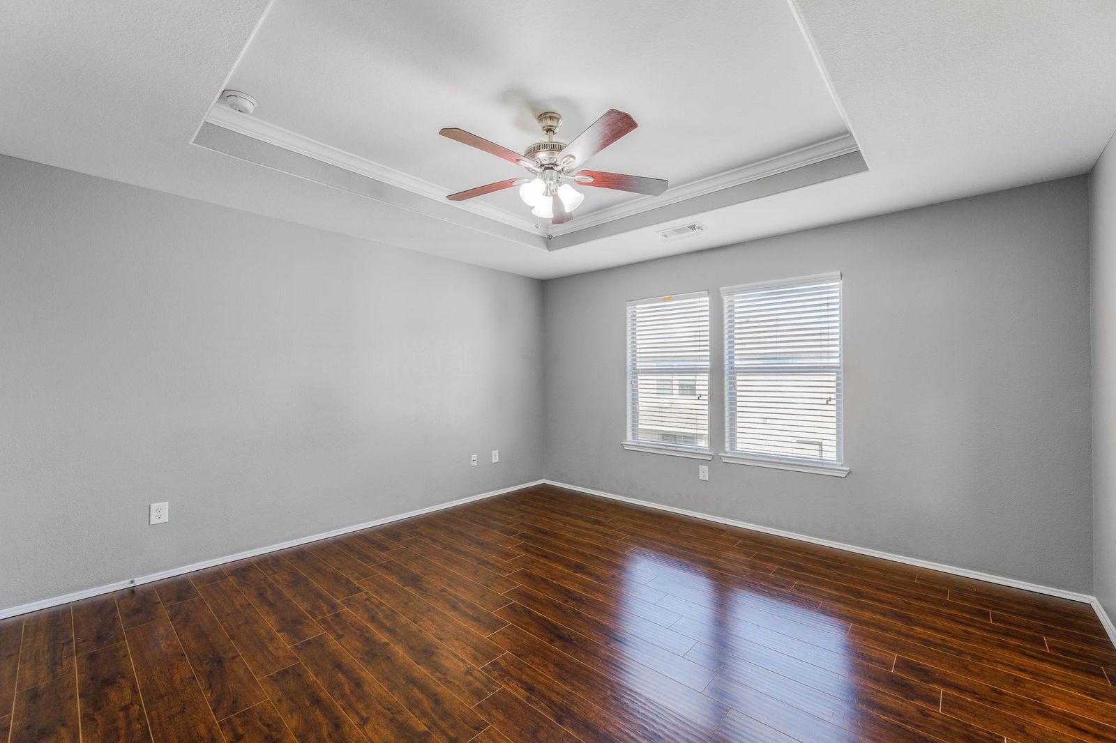 21310 Bandera Ranch Lane Katy, TX 77449 - Photo 28 of 39 a view of an empty room with window and wooden floor