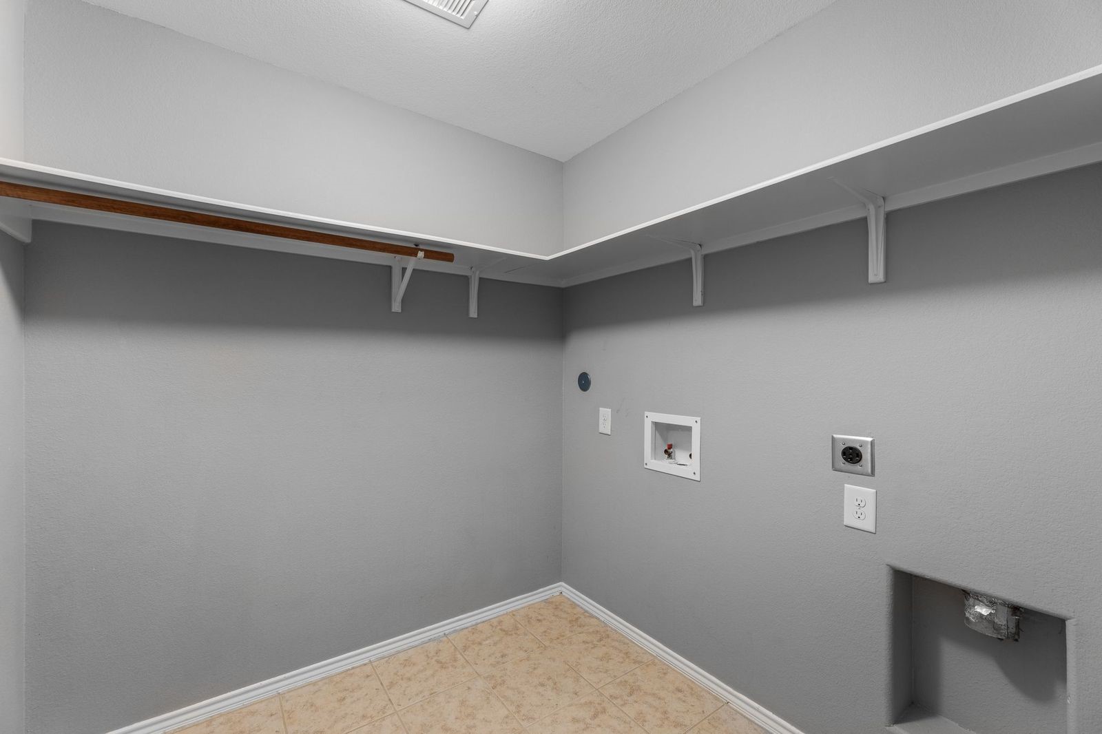 21310 Bandera Ranch Lane Katy, TX 77449 - Photo 34 of 39 a view of a room with shelf on the wall