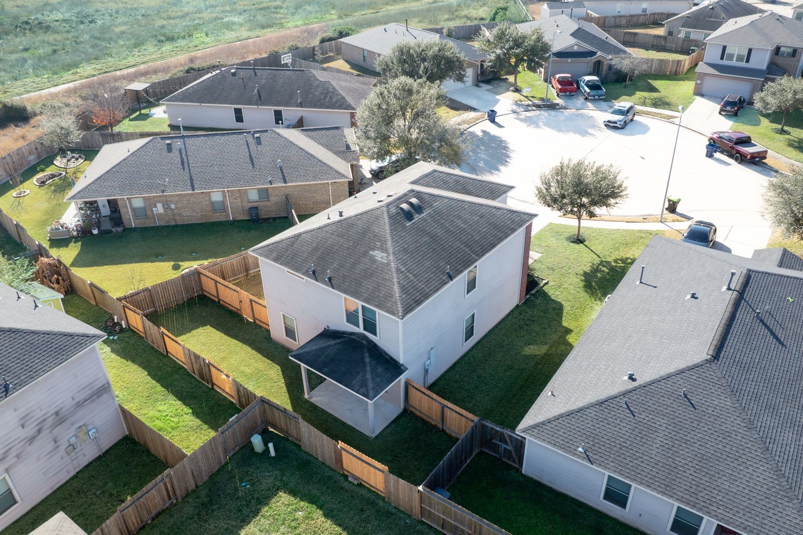 21310 Bandera Ranch Lane Katy, TX 77449 - Photo 38 of 39 an aerial view of a house with a yard