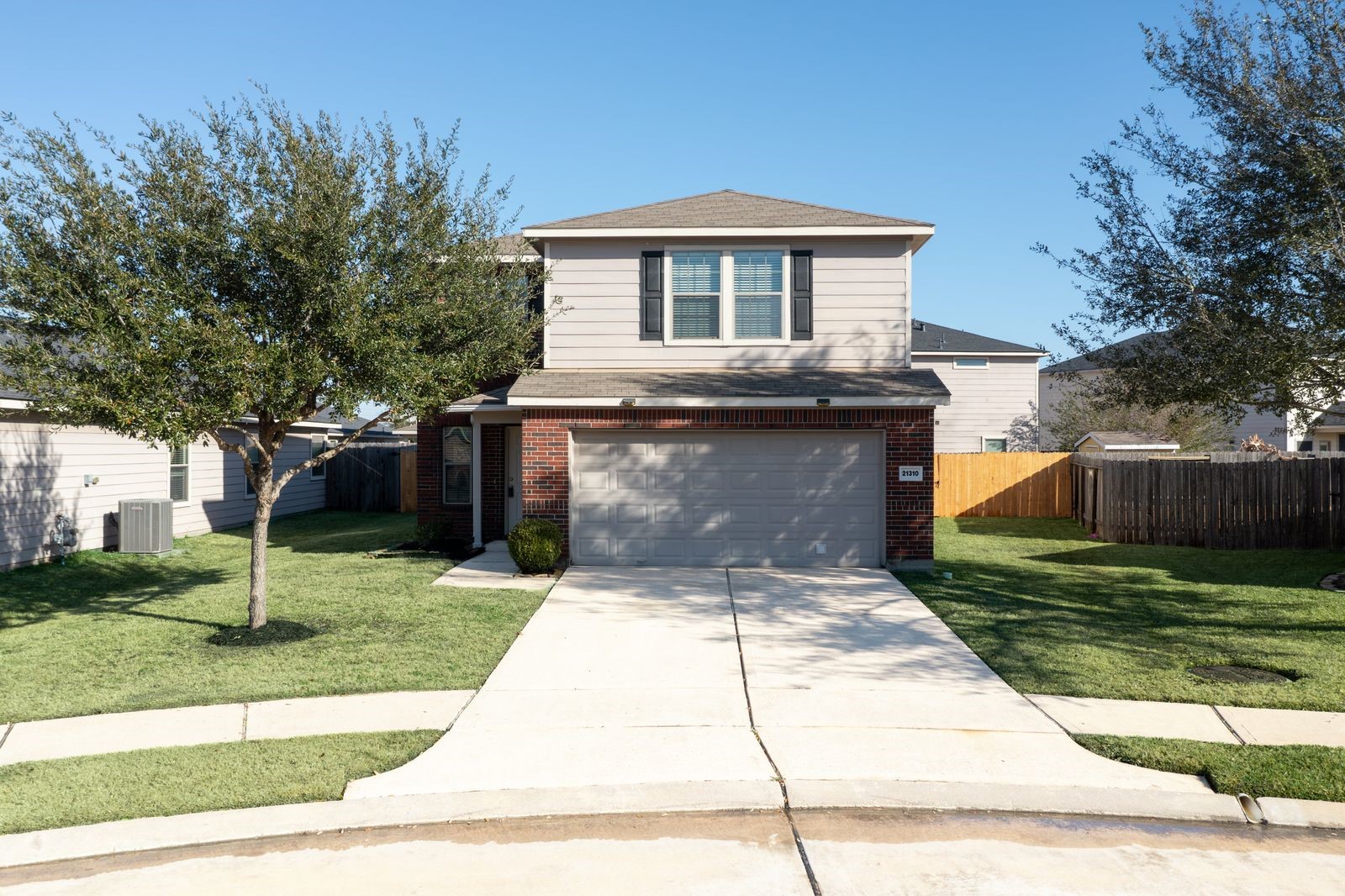 21310 Bandera Ranch Lane Katy, TX 77449 - Photo 4 of 39 a front view of a house with a yard