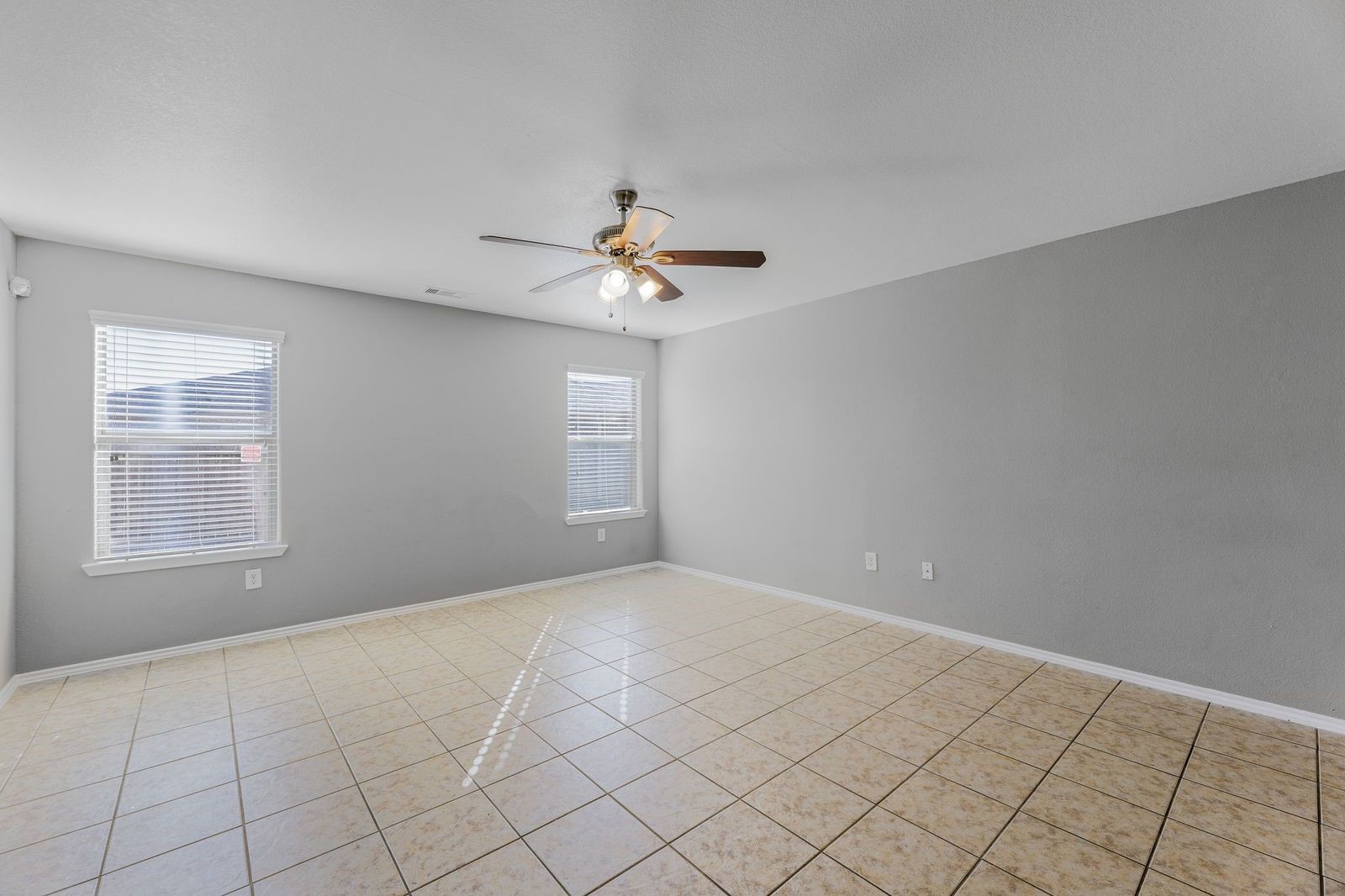 21310 Bandera Ranch Lane Katy, TX 77449 - Photo 8 of 39 a view of an empty room with a window