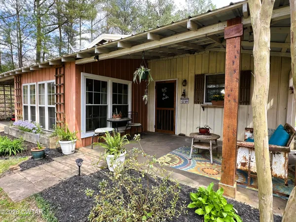 a view of a lounge chairs in the patio