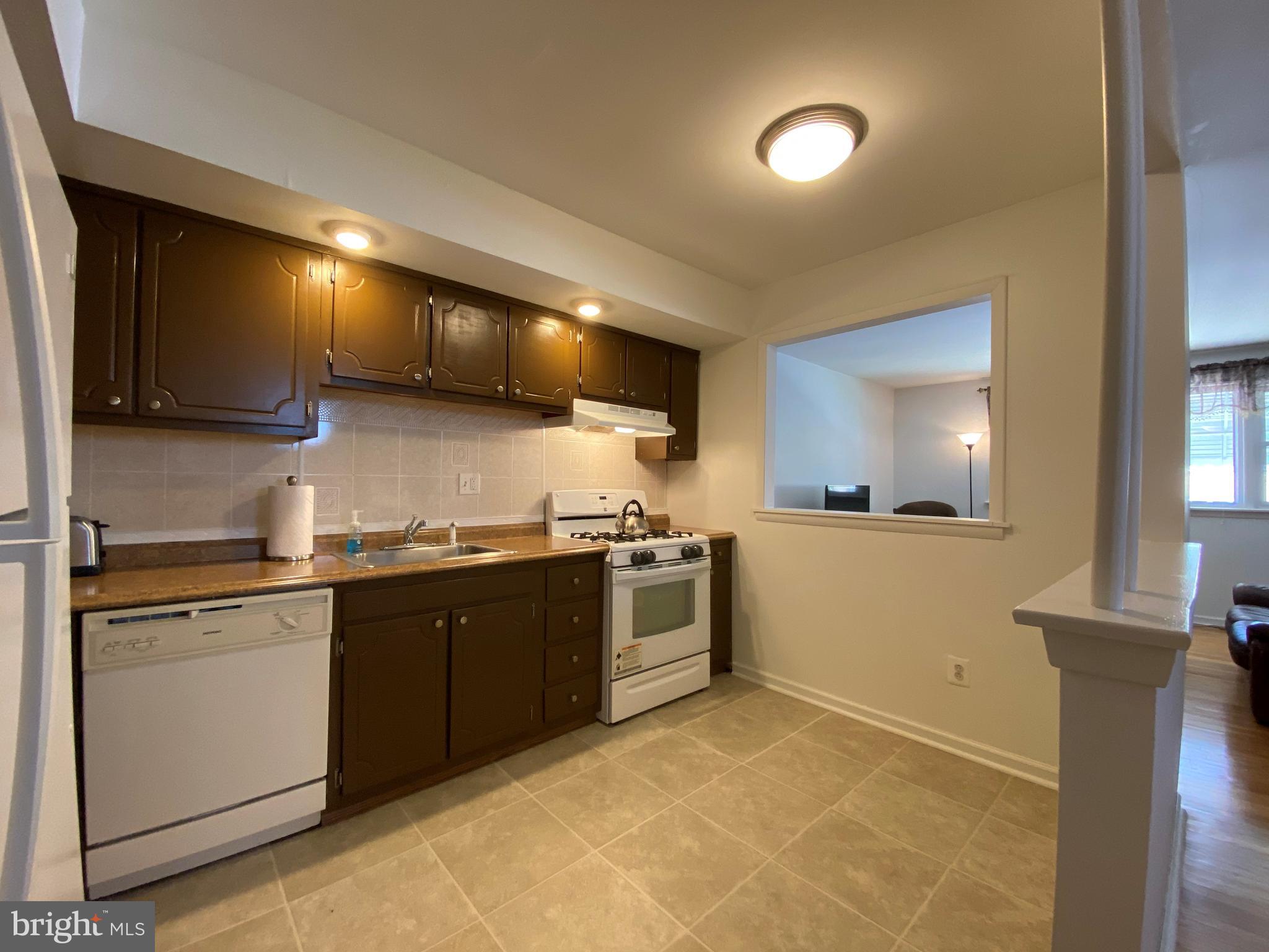 10221 West Keswick Road Philadelphia, PA 19114 - Photo 10 of 33 Kitchen - Overhead Lighting, Neutral Decor