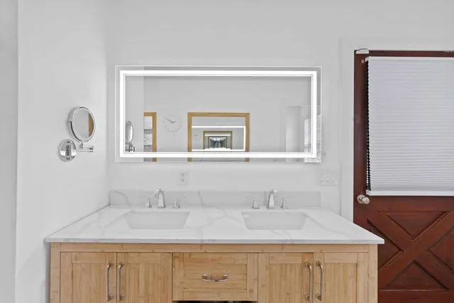 a kitchen with a table and chairs in it