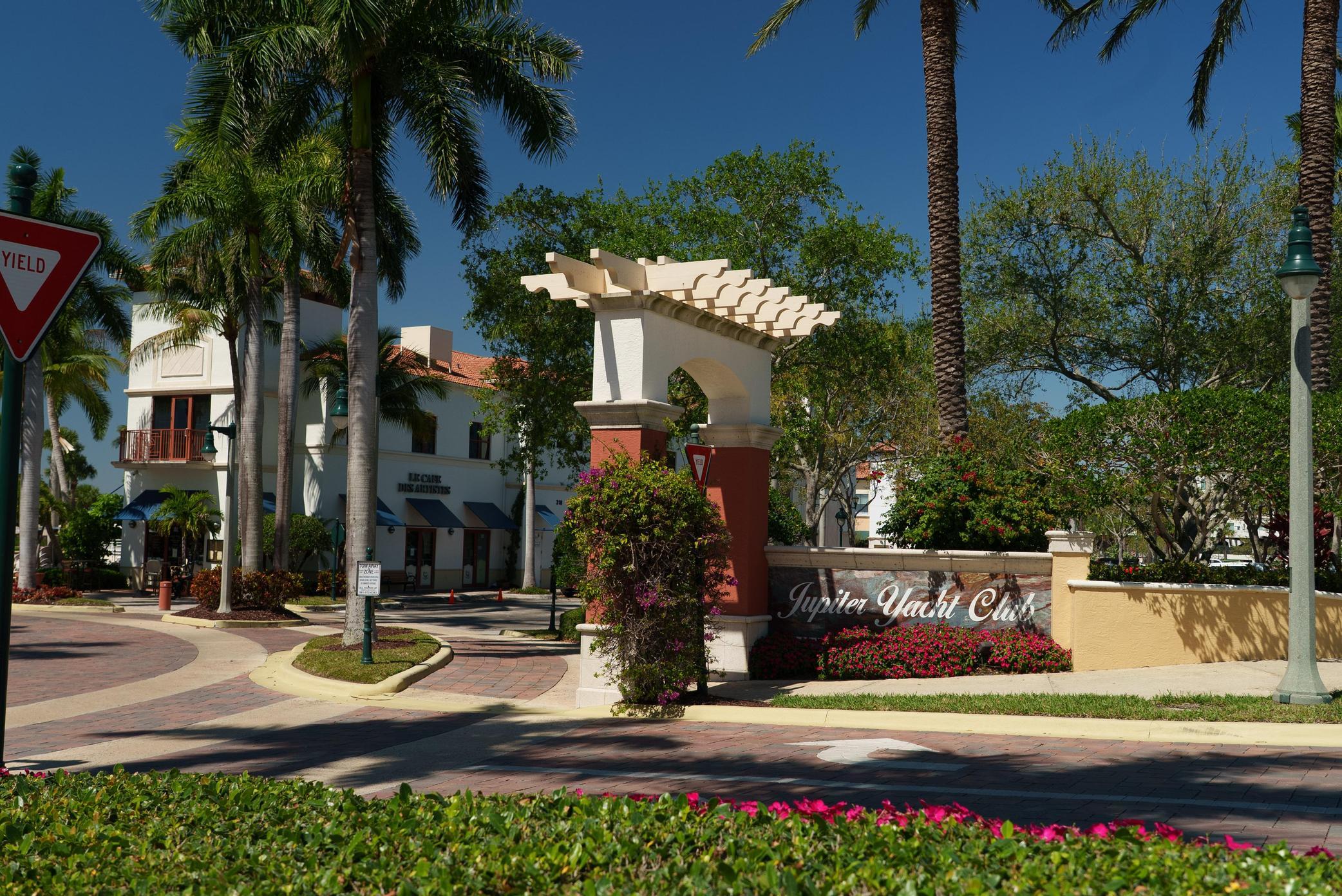 5554 Hibiscus Road Jupiter, FL 33458 - Photo 64 of 70 a view of a house with street