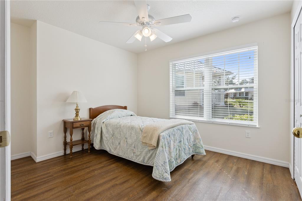 112 Turtle Run Umatilla, FL 32784 - Photo 13 of 32 a bedroom with a bed and a window