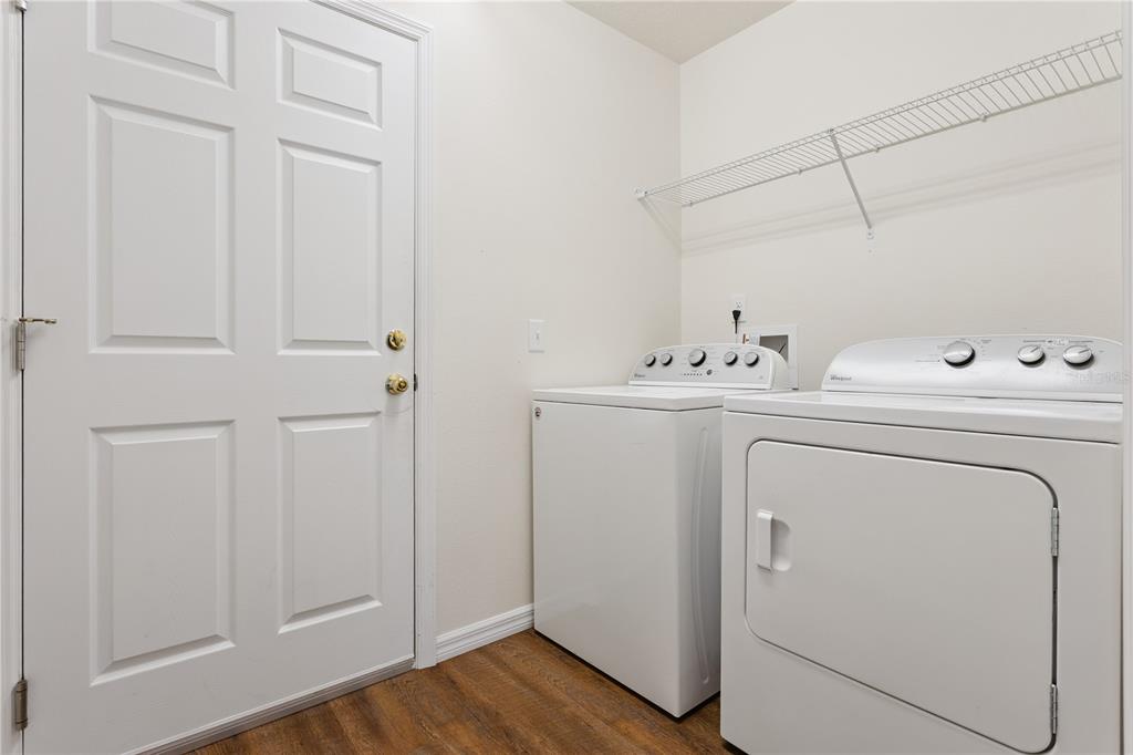 112 Turtle Run Umatilla, FL 32784 - Photo 22 of 32 a utility room with dryer and washer