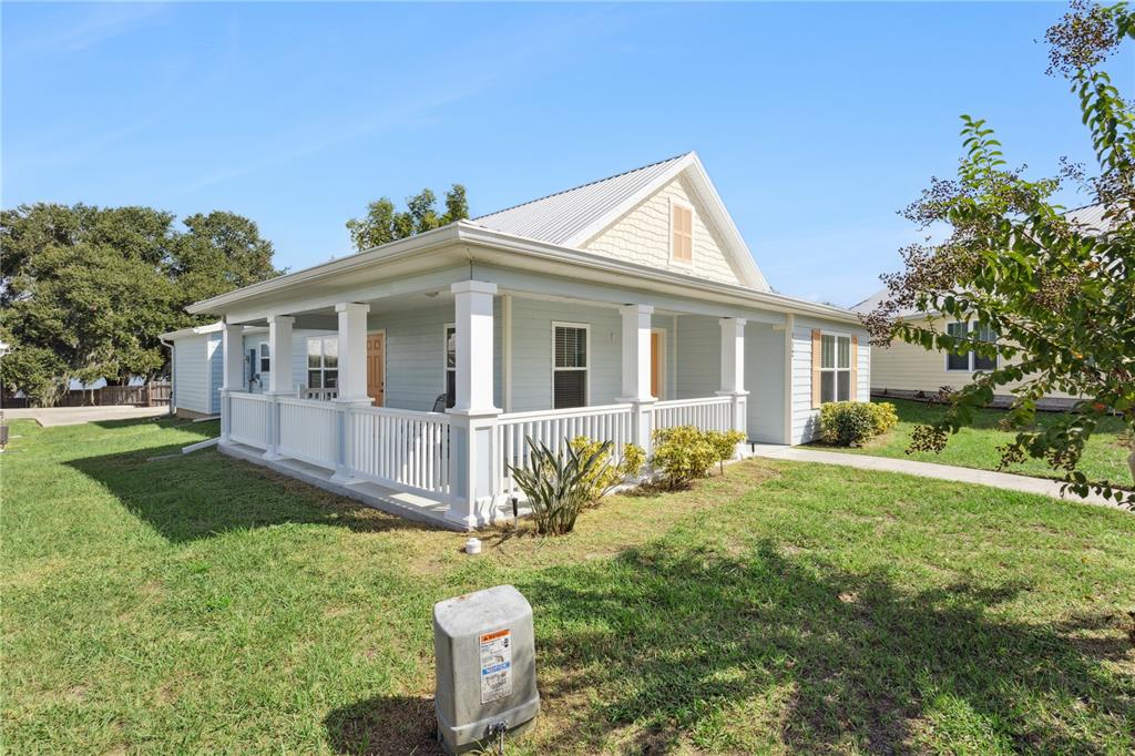 112 Turtle Run Umatilla, FL 32784 - Photo 24 of 32 a view of a house with a yard