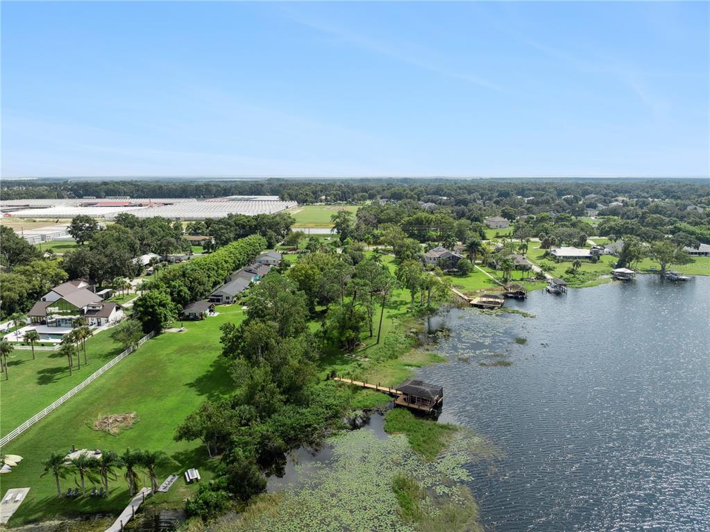 112 Turtle Run Umatilla, FL 32784 - Photo 29 of 32 a view of a lake with houses with outdoor space