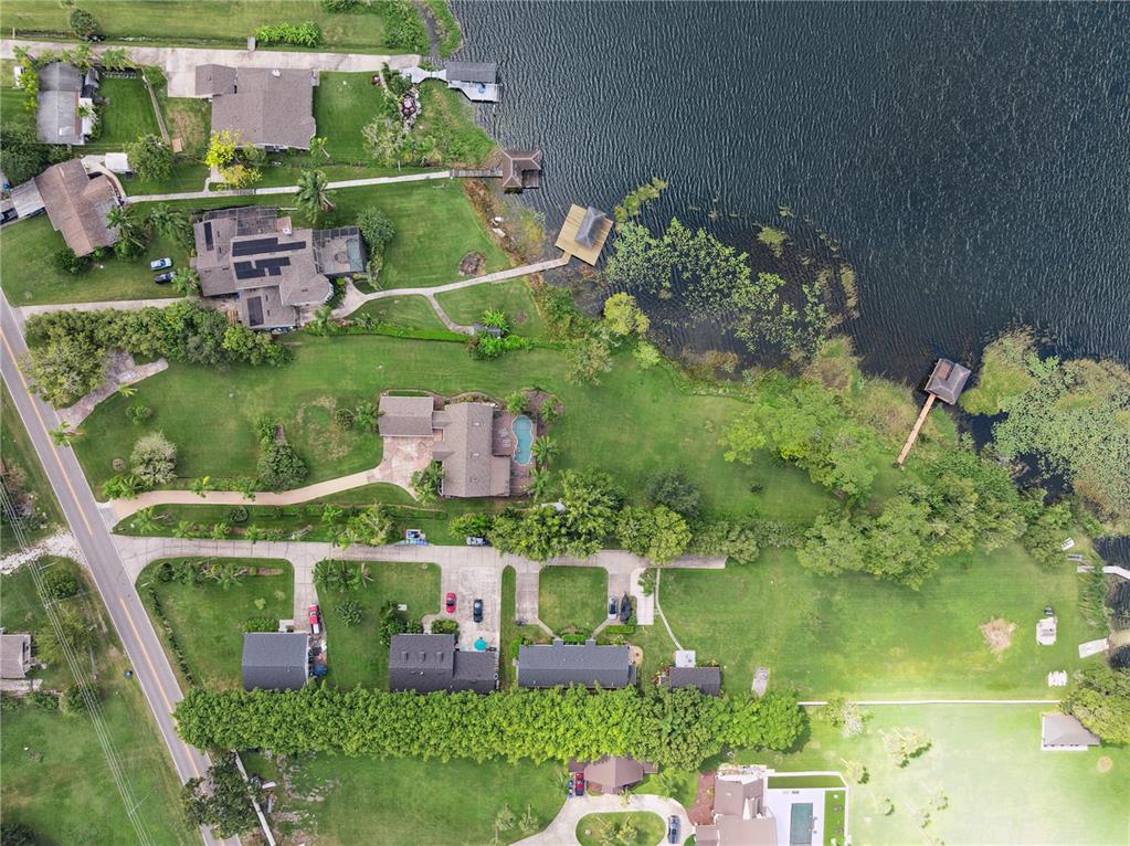 112 Turtle Run Umatilla, FL 32784 - Photo 32 of 32 an aerial view of residential houses with outdoor space and street view