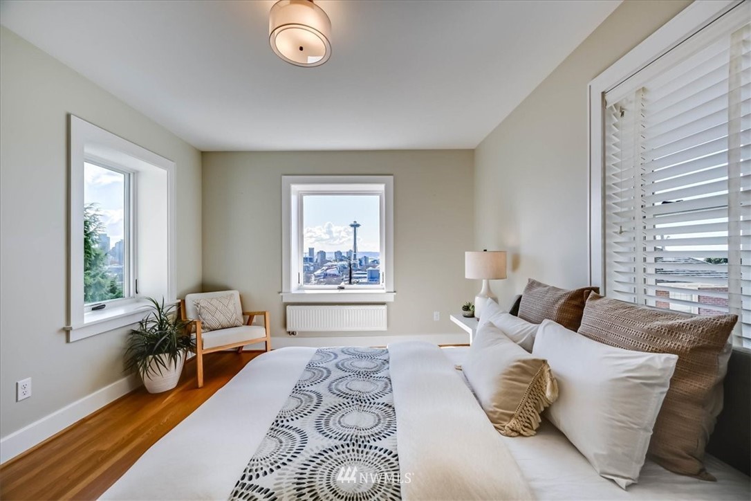 357 Highland Drive Seattle, WA 98109 - Photo 17 of 38 a living room with furniture and a window