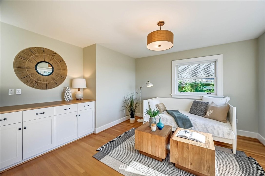 357 Highland Drive Seattle, WA 98109 - Photo 29 of 38 a living room with furniture and a window