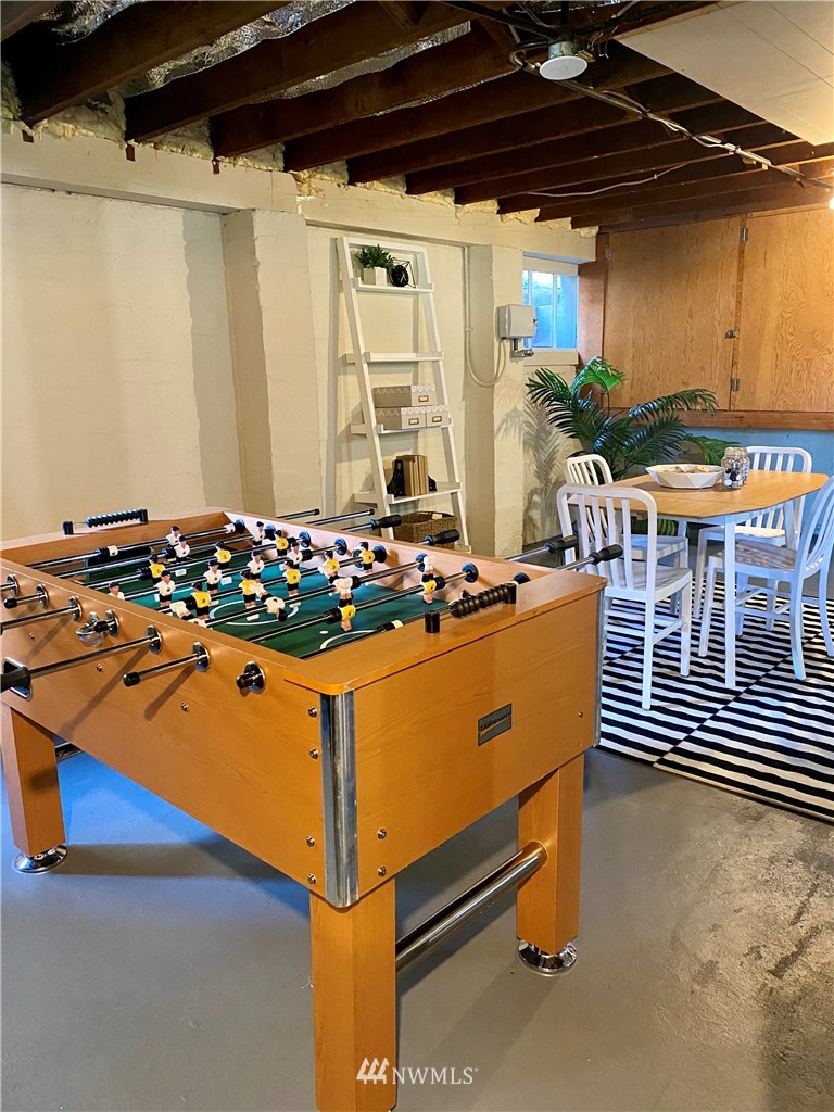 357 Highland Drive Seattle, WA 98109 - Photo 33 of 38 a room with musical instruments