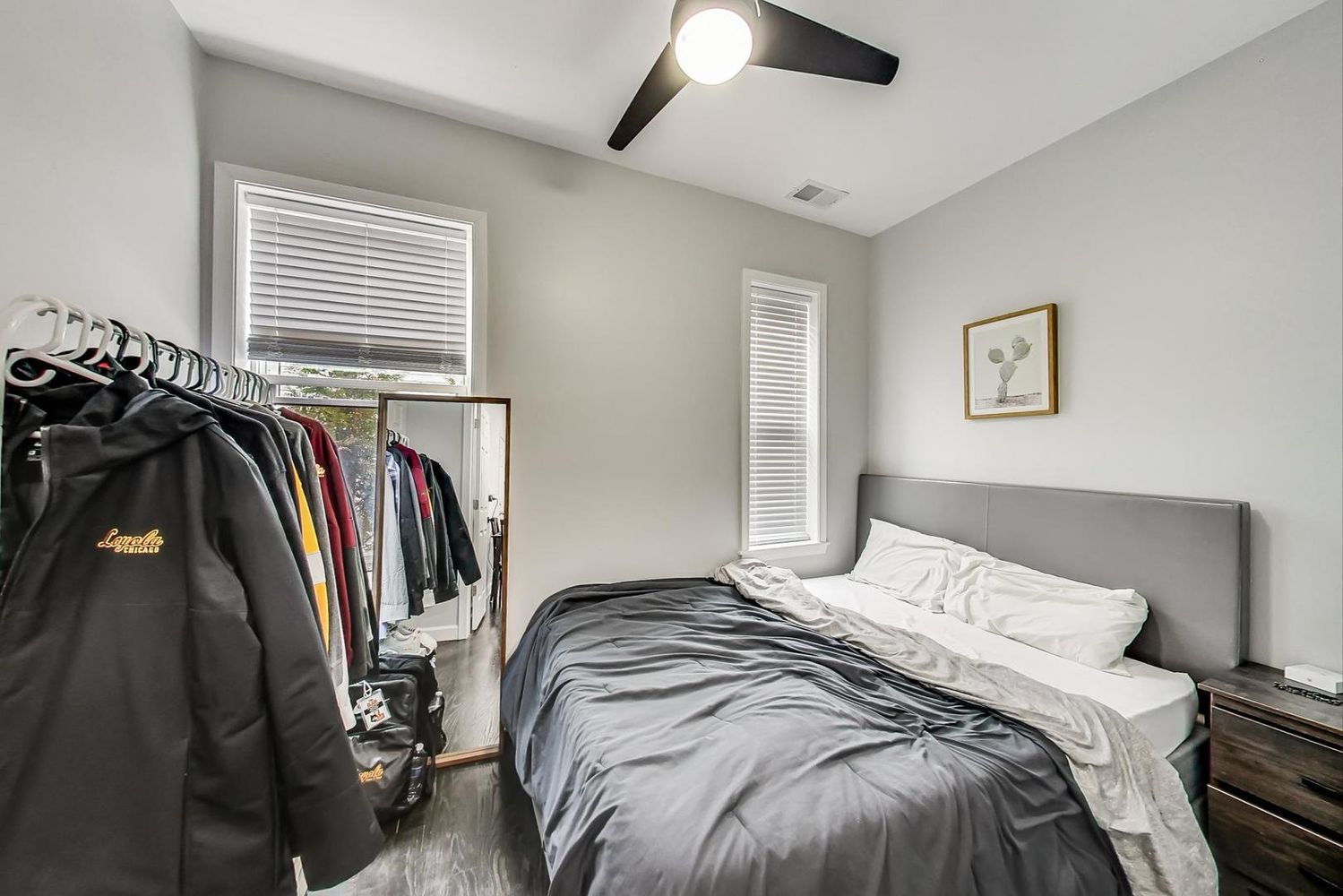 2025 West Melrose Street, Unit 2F Chicago, IL 60618 - Photo 11 of 18 a bedroom with a bed and a closet