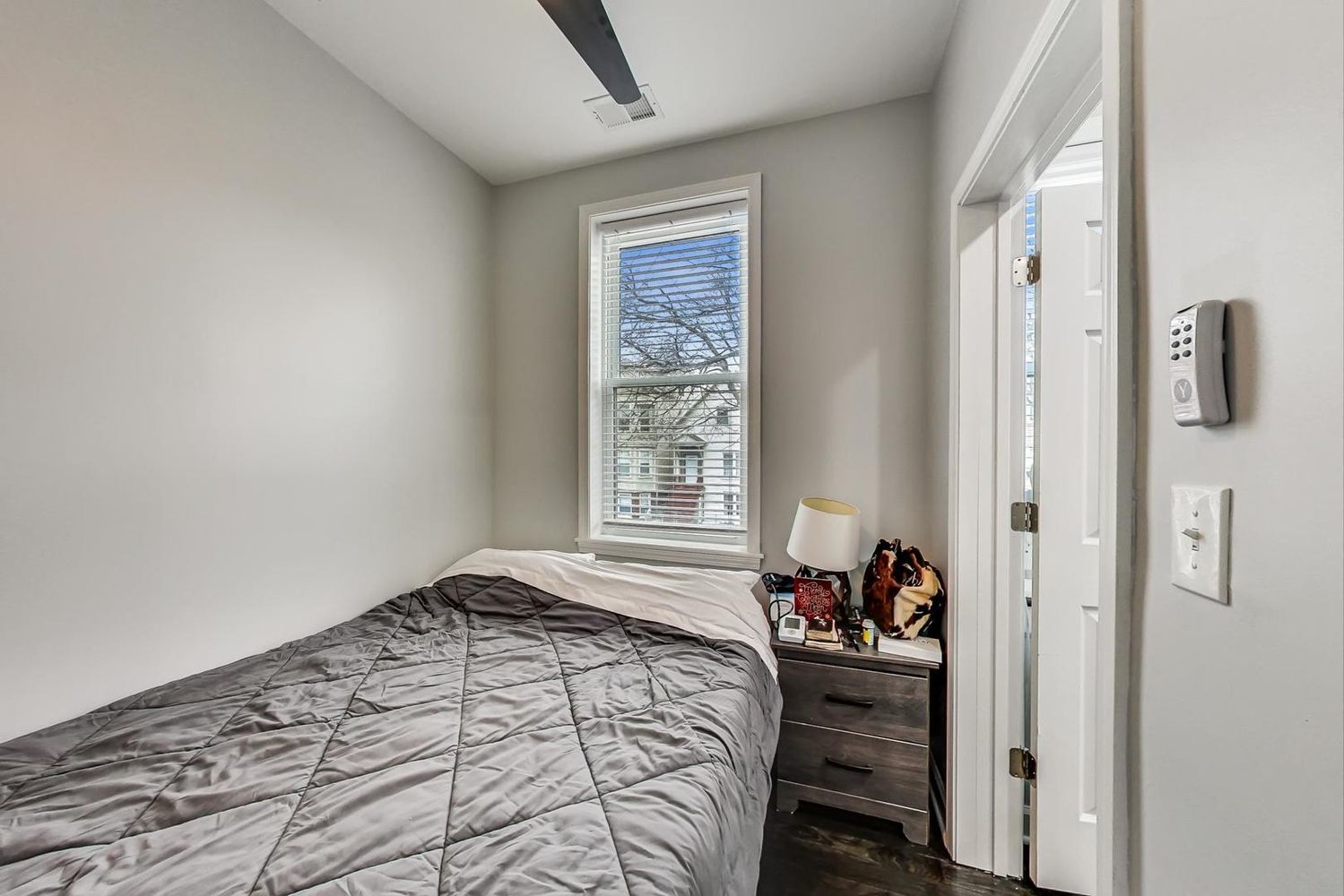 2025 West Melrose Street, Unit 2F Chicago, IL 60618 - Photo 15 of 18 a bedroom with a bed and a window