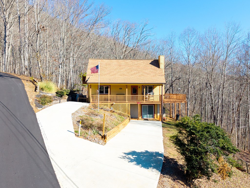224 Shake Rag Road Hiawassee, GA 30546 - Photo 11 of 47 swimming pool with outdoor seating and yard