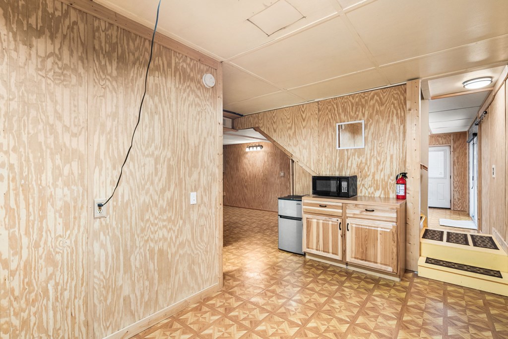 224 Shake Rag Road Hiawassee, GA 30546 - Photo 12 of 47 a kitchen with a stove a sink and a refrigerator