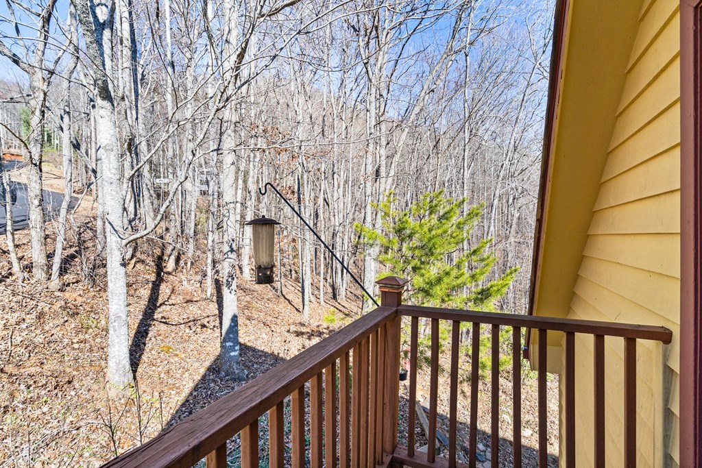 224 Shake Rag Road Hiawassee, GA 30546 - Photo 20 of 47 a view of balcony with wooden fence and floor
