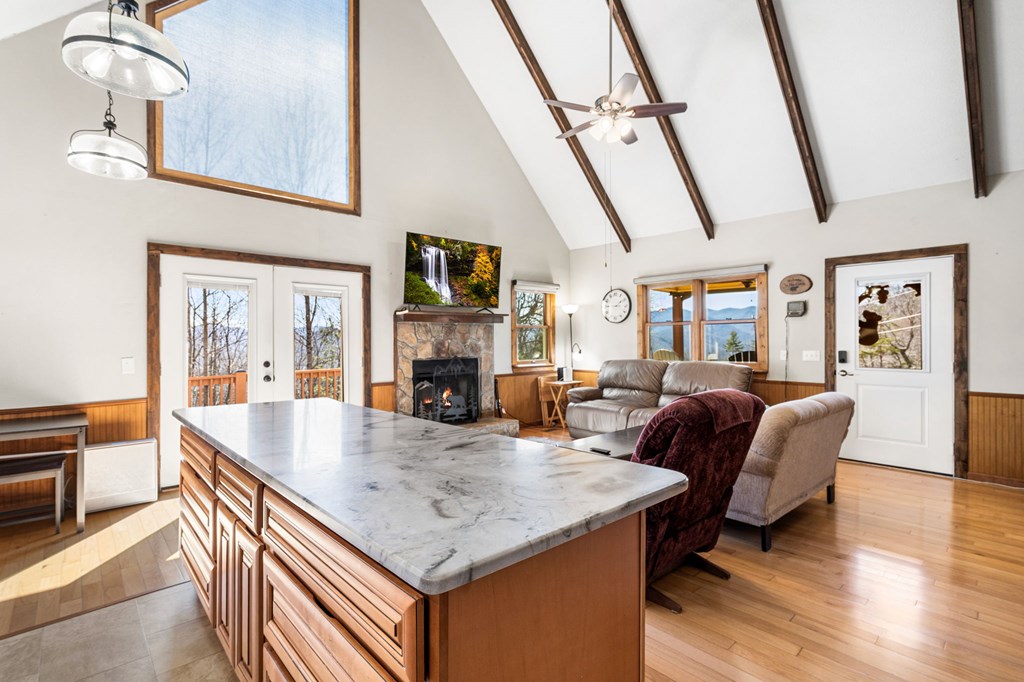 224 Shake Rag Road Hiawassee, GA 30546 - Photo 29 of 47 a living room with furniture and a fireplace