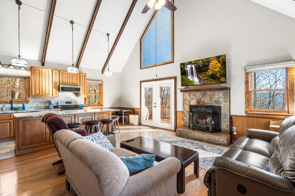 224 Shake Rag Road Hiawassee, GA 30546 - Photo 34 of 47 a living room with furniture and a fireplace