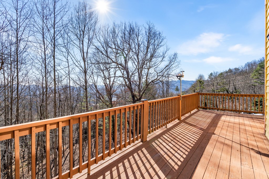 224 Shake Rag Road Hiawassee, GA 30546 - Photo 38 of 47 a view of balcony with wooden floor and fence