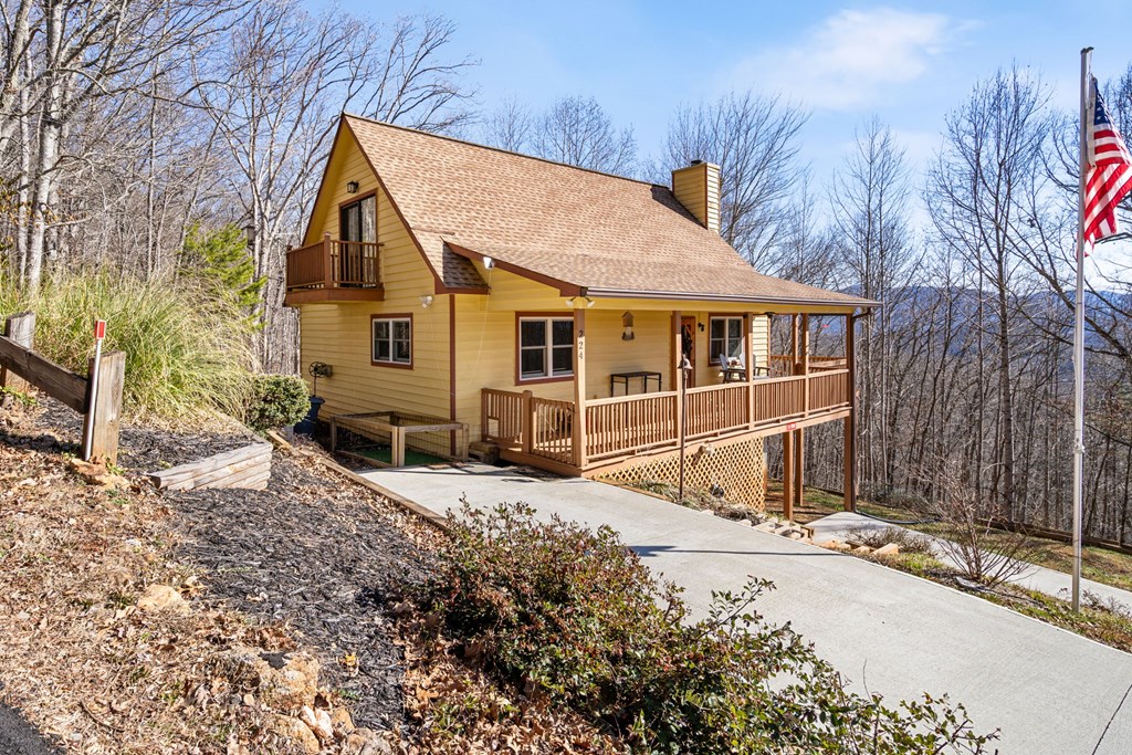 224 Shake Rag Road Hiawassee, GA 30546 - Photo 45 of 47 a view of a house with a yard covered in snow