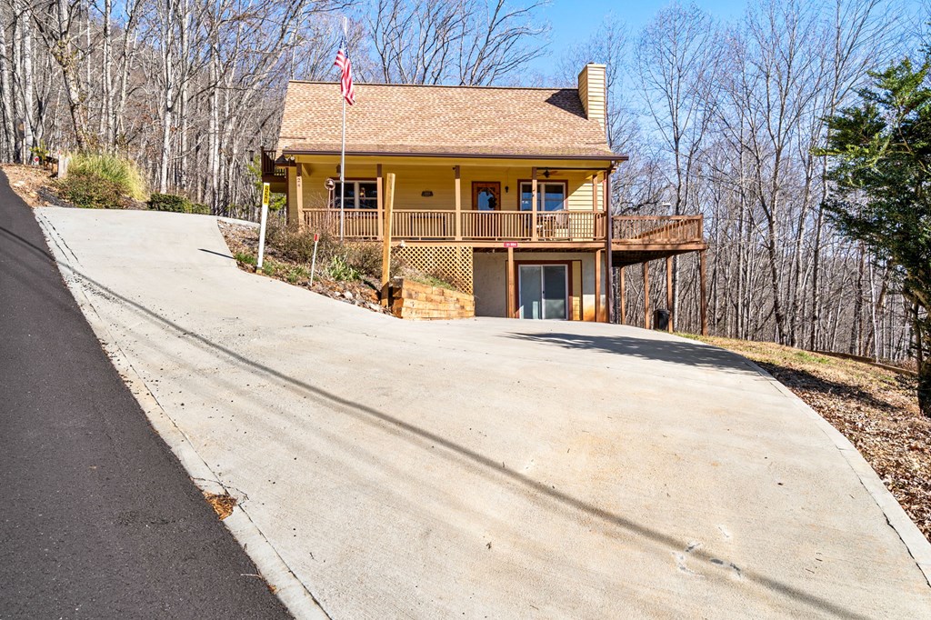 224 Shake Rag Road Hiawassee, GA 30546 - Photo 46 of 47 a front view of a house with a yard