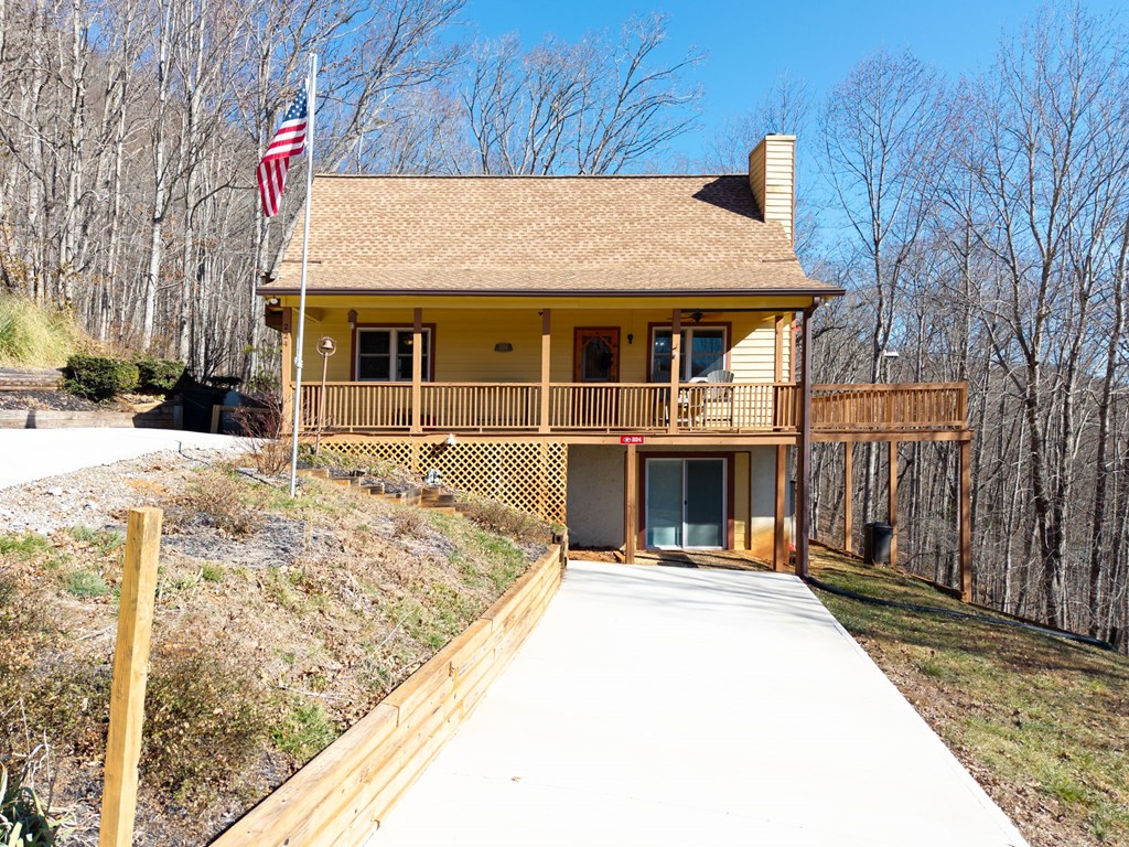 224 Shake Rag Road Hiawassee, GA 30546 - Photo 10 of 47 a view of a house with wooden fence