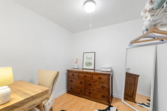 a view of a workspace with furniture