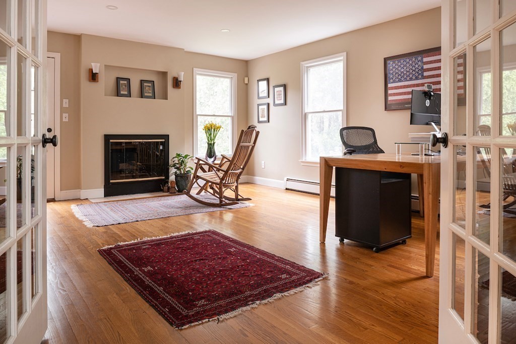 113 Waltham Street Lexington, MA 02421 - Photo 5 of 13 a living room with furniture and a fireplace