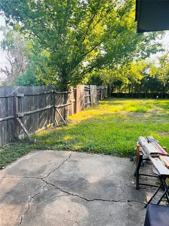 a view of a backyard with a slide