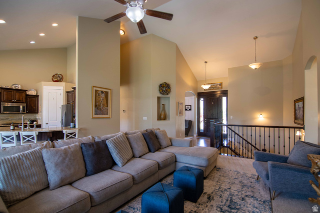 646 East 1400th Street North Mapleton, UT 84664 - Photo 12 of 78 Spacious living area with vaulted ceilings, recessed lighting, and a ceiling fan