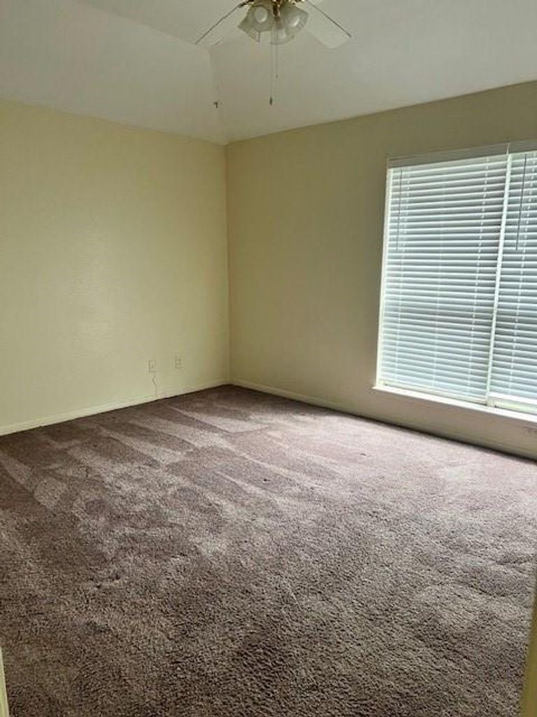 4409 Rattan Avenue Bay City, TX 77414 - Photo 9 of 13 an empty room with a window