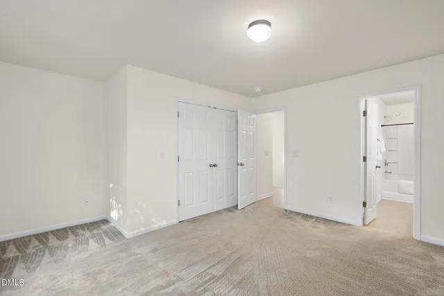 a bathroom with 2 sink toilet and shower