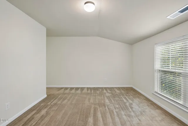 an empty room with an entryway