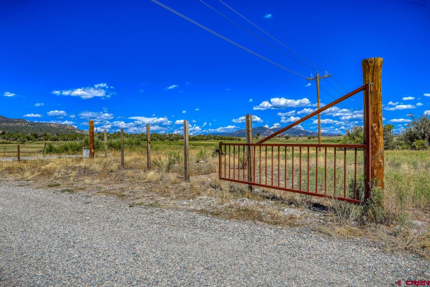 13806 State Highway Ignacio, CO 81137 - Photo 19 of 45 a view of a yard with swimming pool